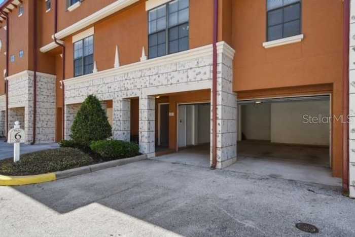 photo 2: 6111 METROWEST BOULEVARD Unit 105, ORLANDO FL 32835