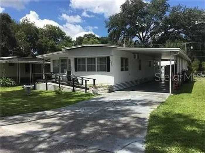 photo 1: 5033 LITTLE LAKE COURT, ZEPHYRHILLS FL 33542