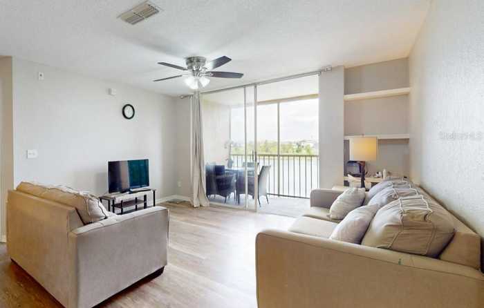 photo 2: 8801 LATREC AVENUE Unit 8208, ORLANDO FL 32819