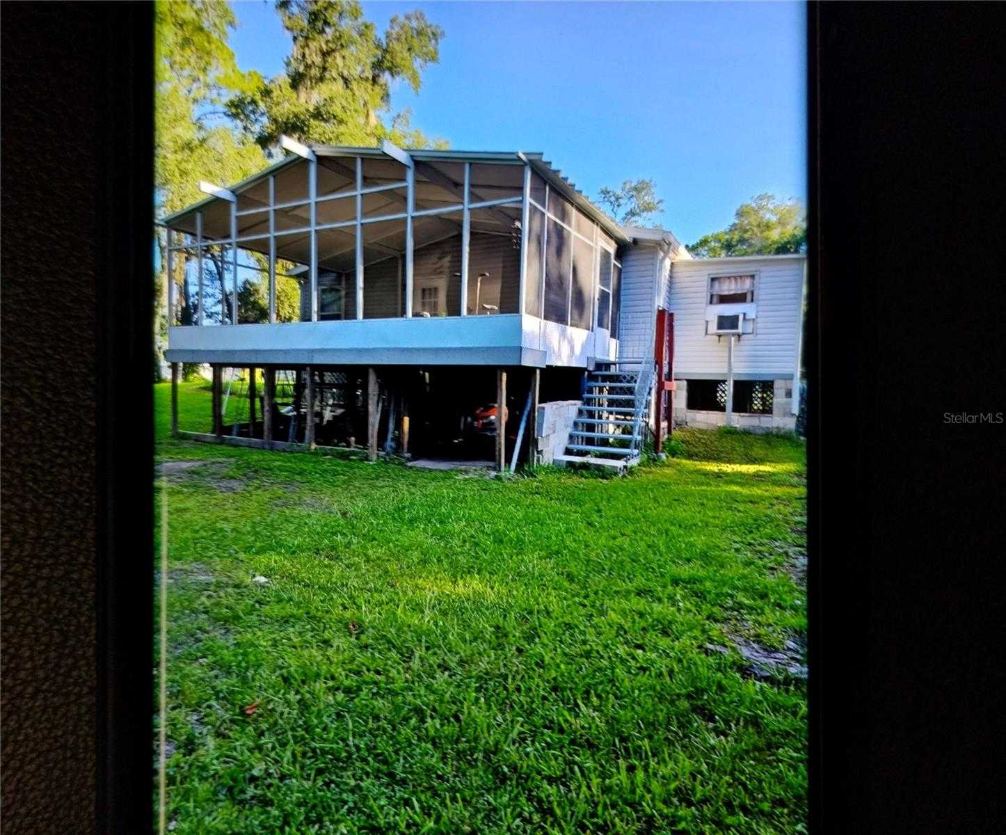 photo 2: 2040 DEER LANE, ZEPHYRHILLS FL 33540