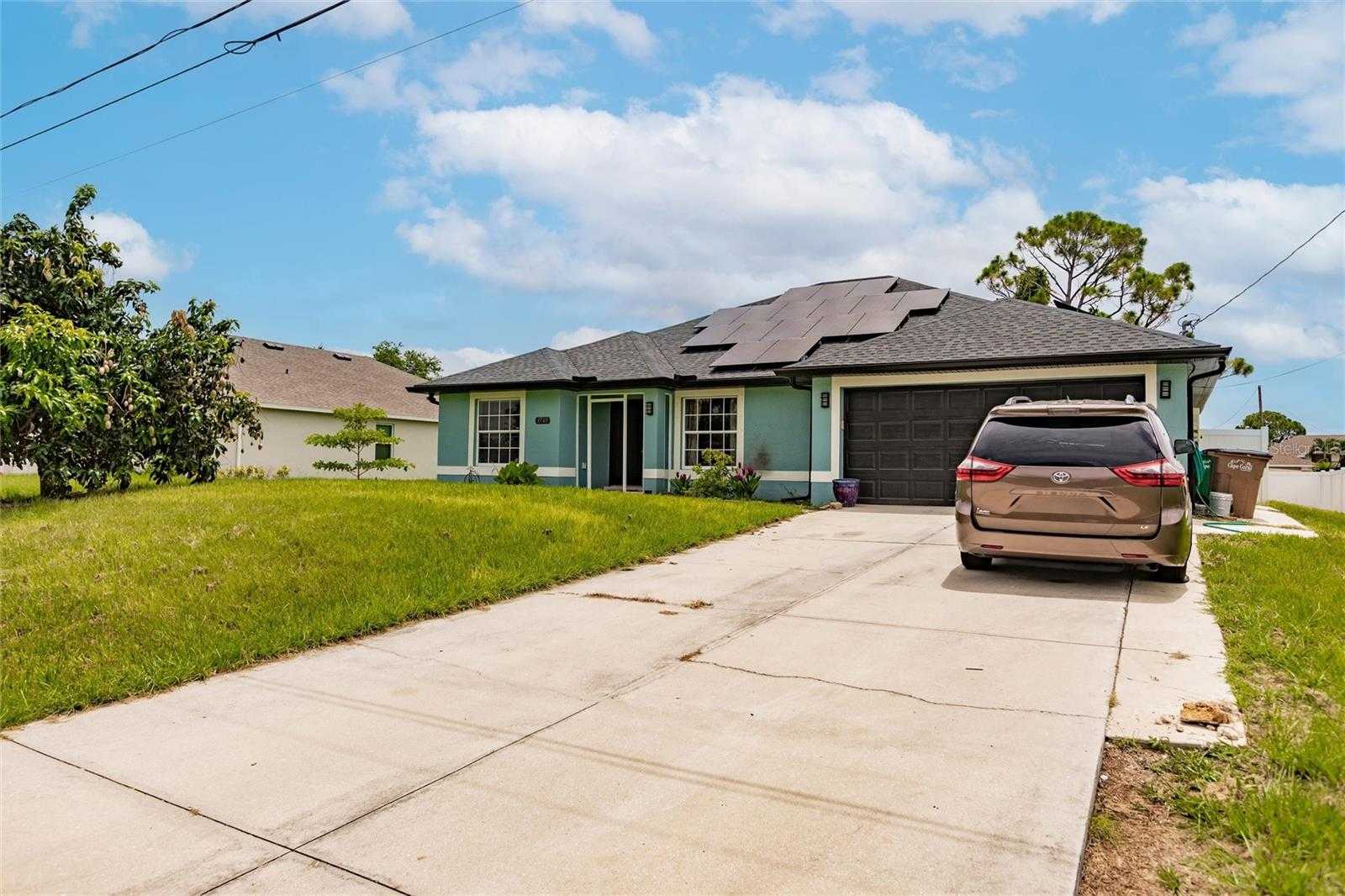 photo 3: 3705 NE 15TH AVENUE, CAPE CORAL FL 33909