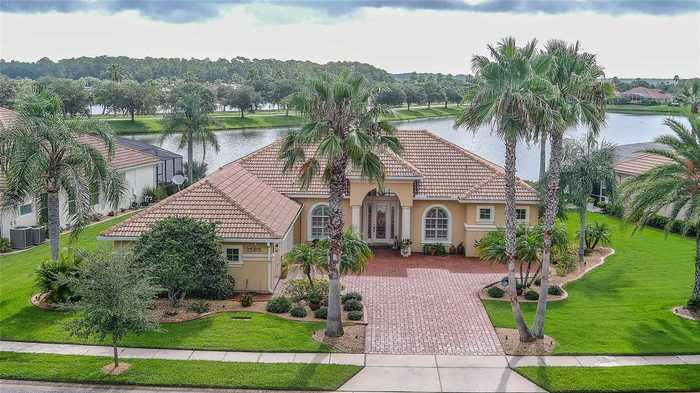 photo 1: 3585 MARIBELLA DRIVE, NEW SMYRNA BEACH FL 32168