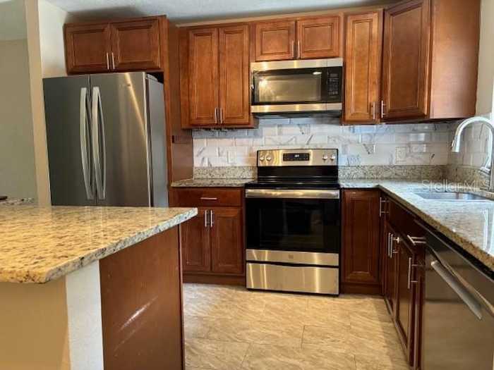 photo 2: 2411 RIO PINAR LAKES BOULEVARD, ORLANDO FL 32822