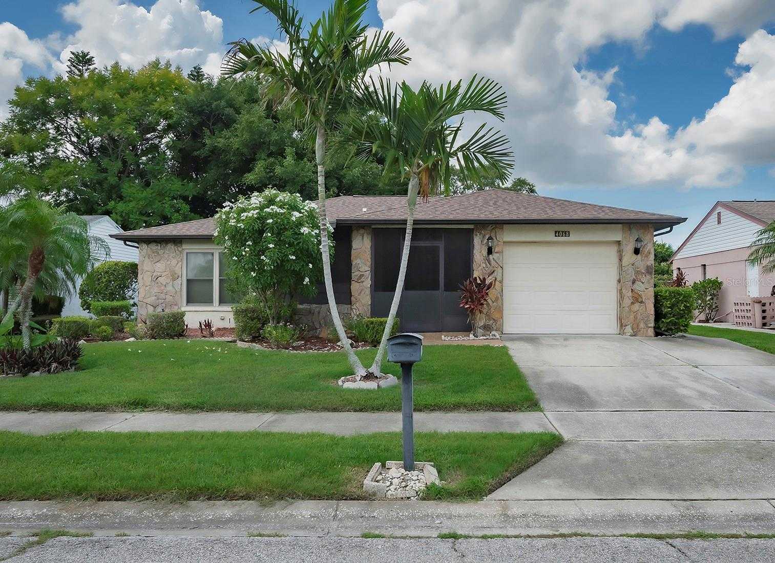 photo 1: 4068 104TH AVENUE N, CLEARWATER FL 33762