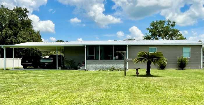 photo 1: 39939 PRETTY POND ROAD, ZEPHYRHILLS FL 33540