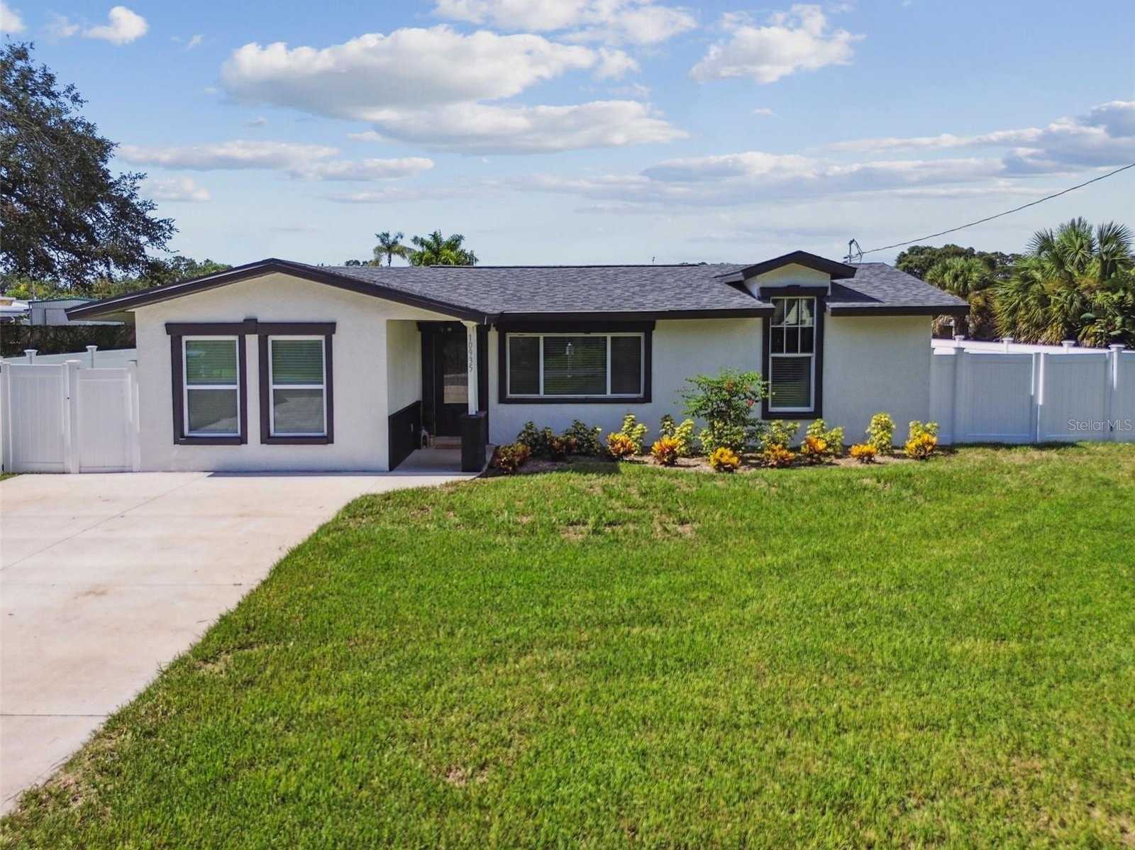 photo 1: 10935 OAKDALE TERRACE, SEMINOLE FL 33772