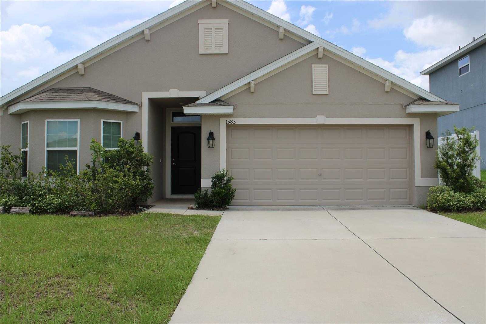 photo 1: 1383 BUCKEYE TRACE BOULEVARD, WINTER HAVEN FL 33881