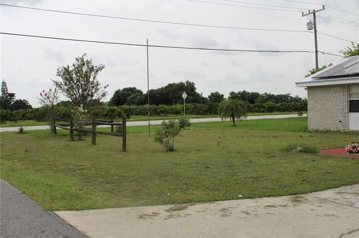 photo 11: 698 S OAKDALE AVENUE, AVON PARK FL 33825