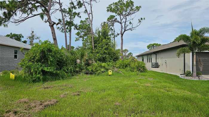 photo 1: 221 AUSTRALIAN DRIVE, ROTONDA WEST FL 33947