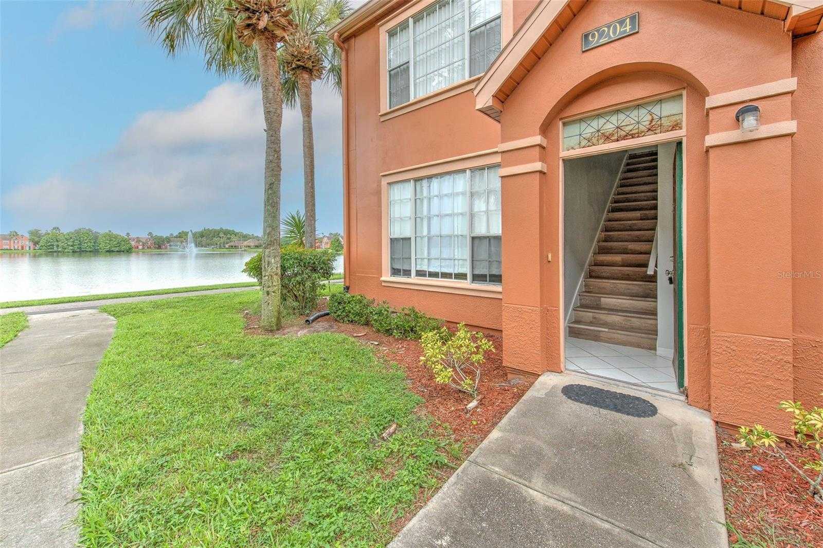 photo 2: 9204 LAKE CHASE ISLAND WAY Unit 9204, TAMPA FL 33626