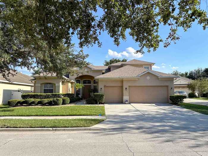 photo 1: 6942 REMINGTON VIEW COURT, ORLANDO FL 32829