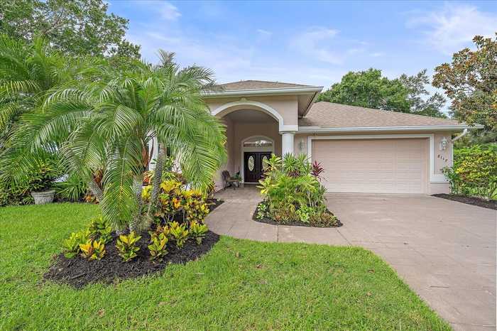 photo 2: 8117 MISTY OAKS BOULEVARD, SARASOTA FL 34243