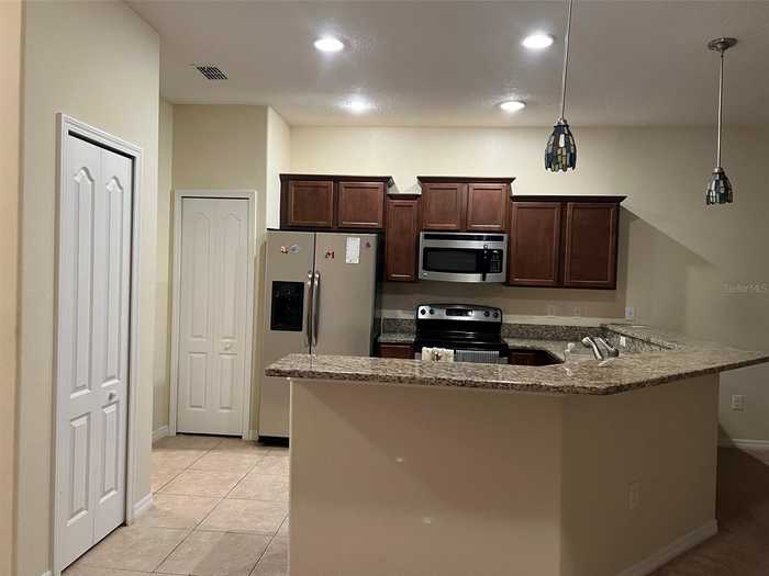 photo 2: 37603 GEORGINA TERRACE, ZEPHYRHILLS FL 33542