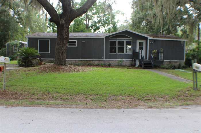 photo 1: 3860 NE 60TH COURT, SILVER SPRINGS FL 34488