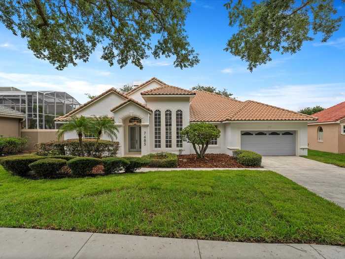 photo 1: 7685 MILANO DRIVE, ORLANDO FL 32835