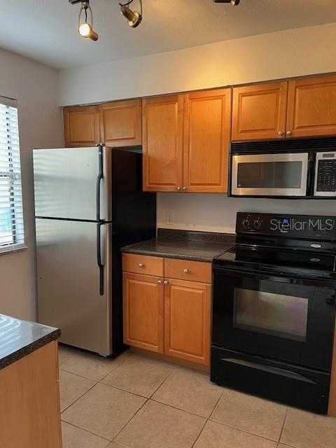 photo 3: 10196 SAILWINDS BOULEVARD S Unit 103, LARGO FL 33773