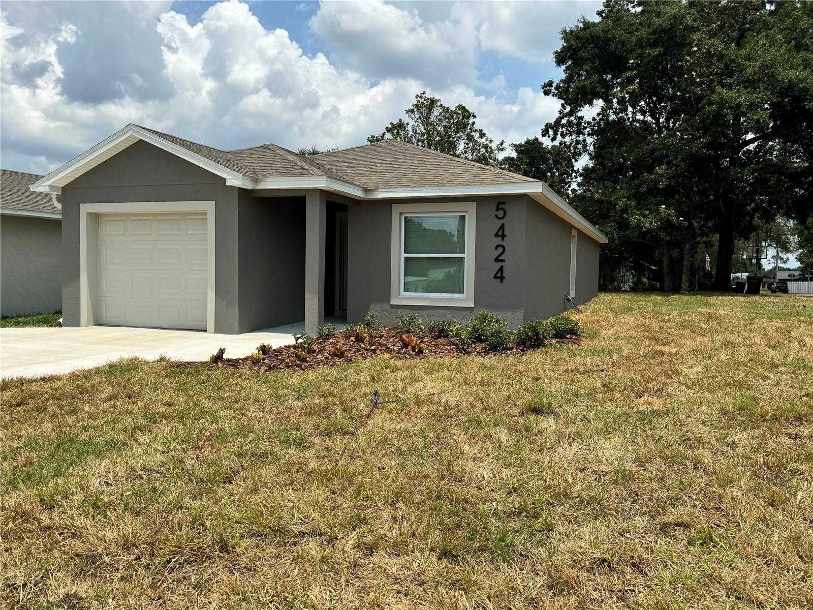 photo 1: 4107 LEMON AVENUE SE, HIGHLAND CITY FL 33846