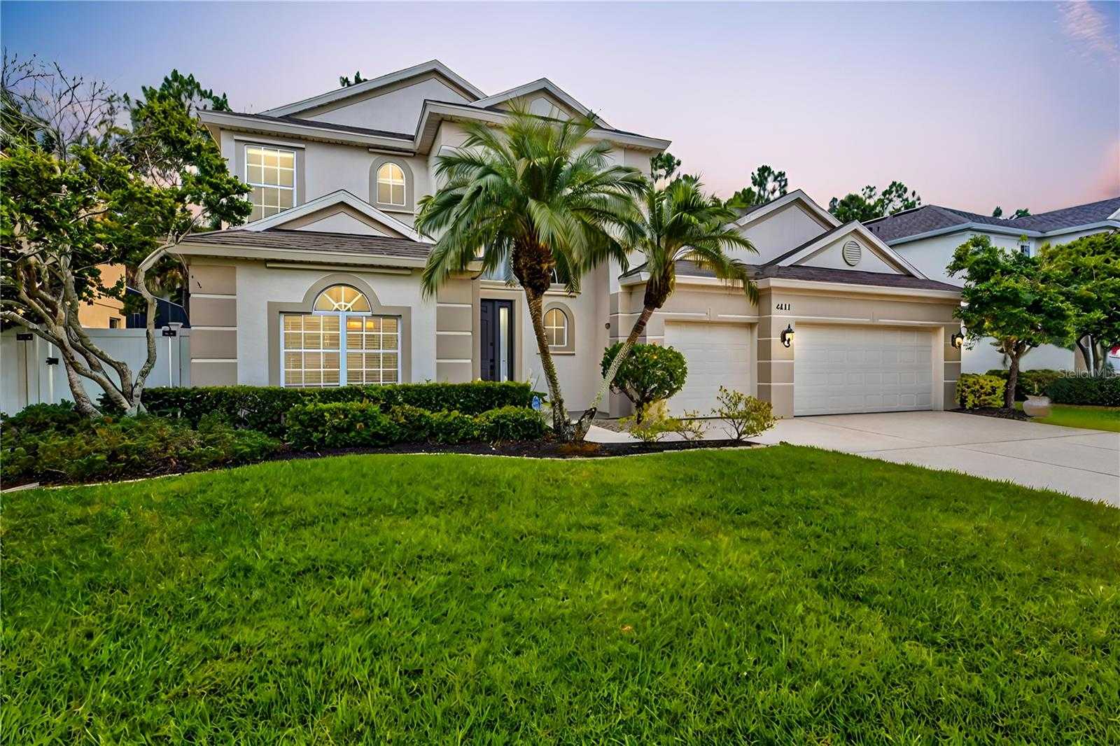 photo 1: 4411 67TH AVENUE CIRCLE E, SARASOTA FL 34243