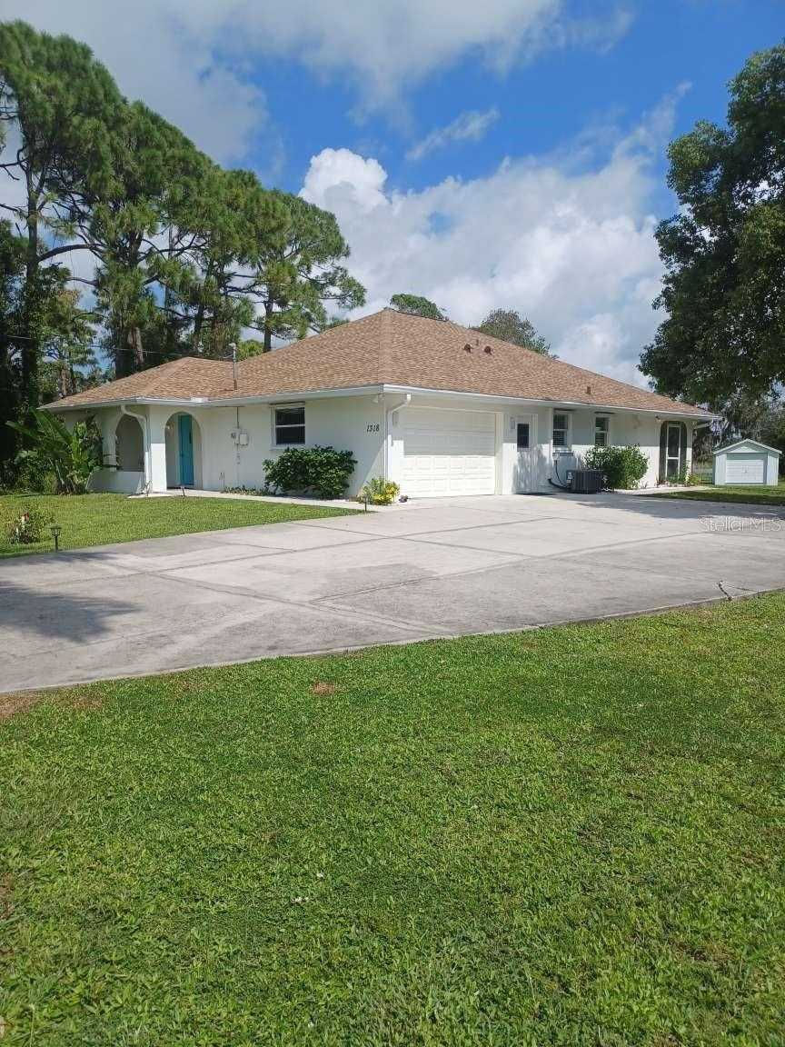 photo 1: 1318 MANASOTA BEACH ROAD, ENGLEWOOD FL 34223