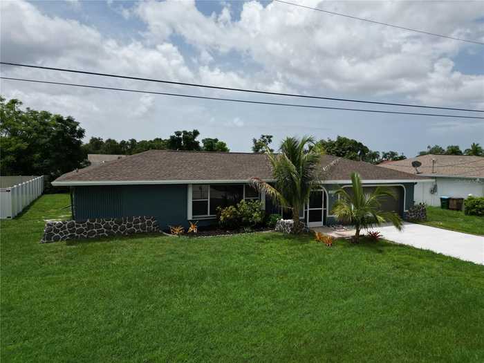 photo 1: 2122 SE 13TH TERRACE S, CAPE CORAL FL 33990