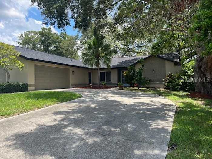 photo 1: 4922 LAKE VALENCIA BOULEVARD W, PALM HARBOR FL 34684