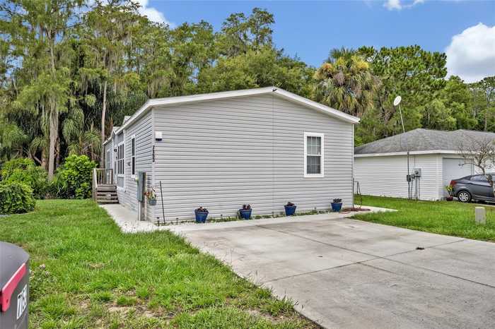 photo 1: 7153 ALAMANDA BOULEVARD W, LAKE WALES FL 33898