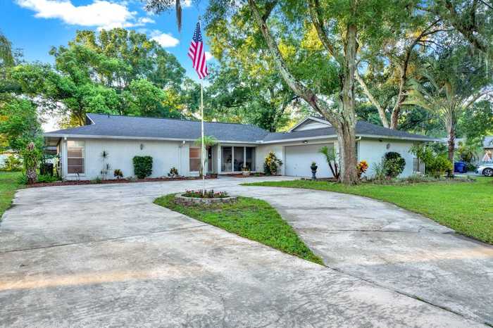 photo 1: 3320 LAKE PADGETT DRIVE, LAND O LAKES FL 34639