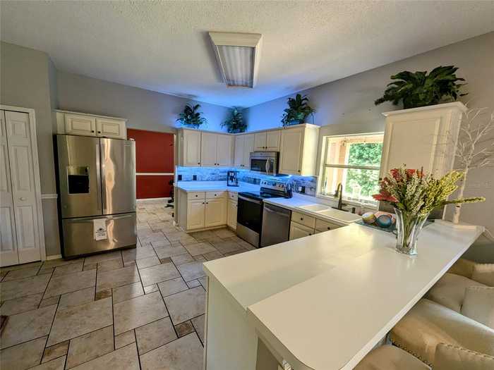 photo 2: 13832 RIVERPATH GROVE DRIVE, ORLANDO FL 32826