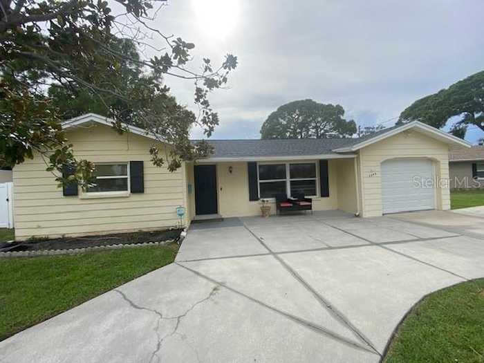 photo 1: 6040 DENVER STREET NE, ST PETERSBURG FL 33703