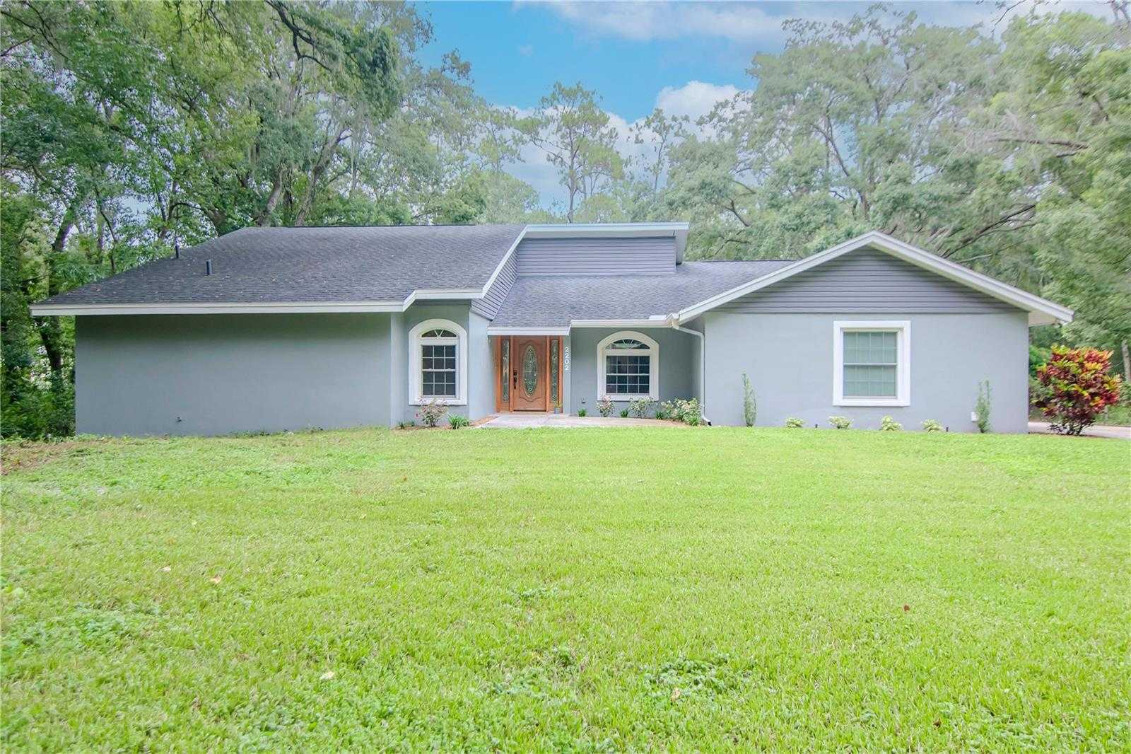 photo 1: 2202 ANDRE DRIVE, LUTZ FL 33549