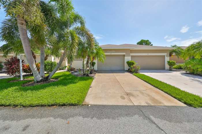 photo 1: 633 TREMONT GREENS LANE Unit 16, SUN CITY CENTER FL 33573