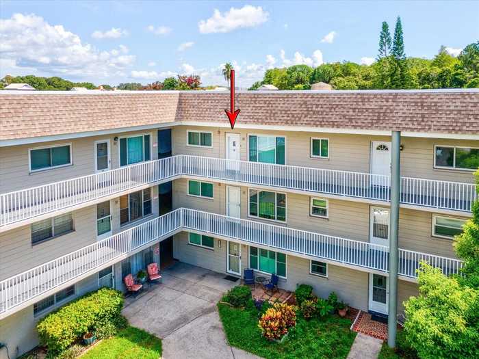 photo 1: 2440 WORLD PARKWAY BOULEVARD Unit 52, CLEARWATER FL 33763