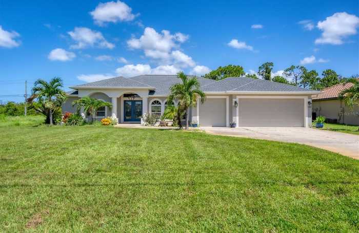 photo 1: 423 BOUNDARY BOULEVARD, ROTONDA WEST FL 33947