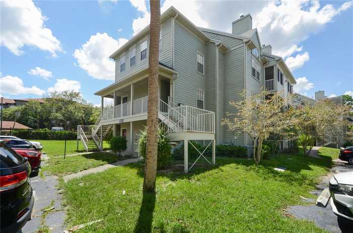 photo 1: 6154 WESTGATE DRIVE Unit 302, ORLANDO FL 32835