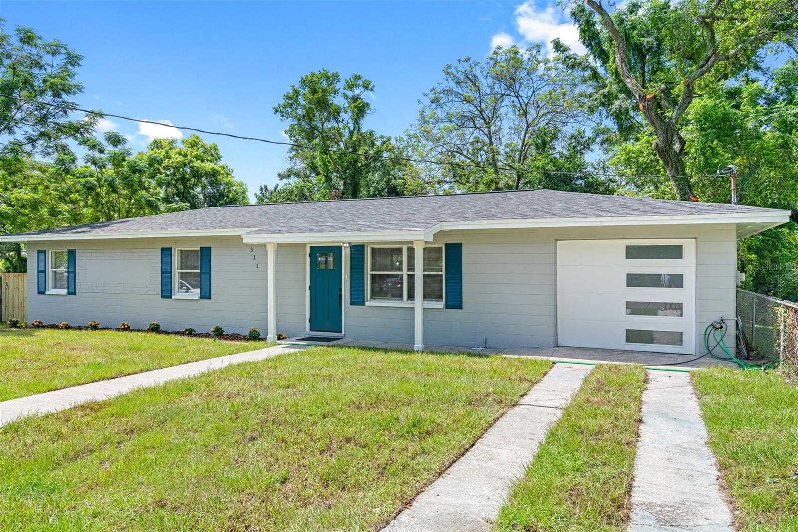 photo 1: 311 E 120TH AVENUE, TAMPA FL 33612