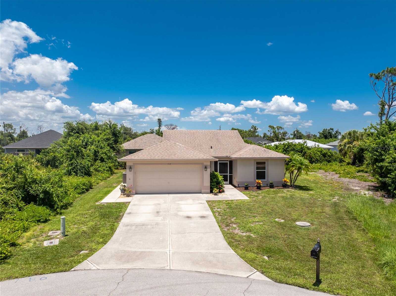 photo 1: 142 SWAN DRIVE, ROTONDA WEST FL 33947