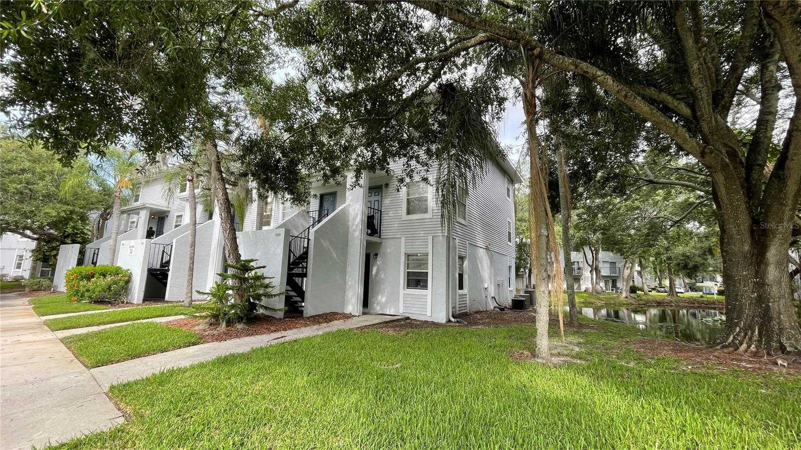 photo 1: 7120 WATERSIDE DRIVE Unit 106, TAMPA FL 33617