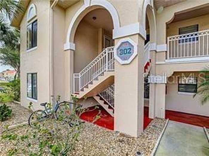 photo 1: 302 HARBOUR BOULEVARD Unit 102, NEW SMYRNA BEACH FL 32169