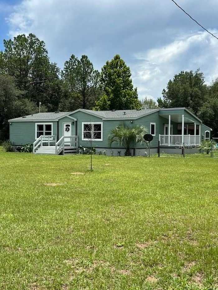 photo 1: 8450 NE 115 STREET, BRONSON FL 32621