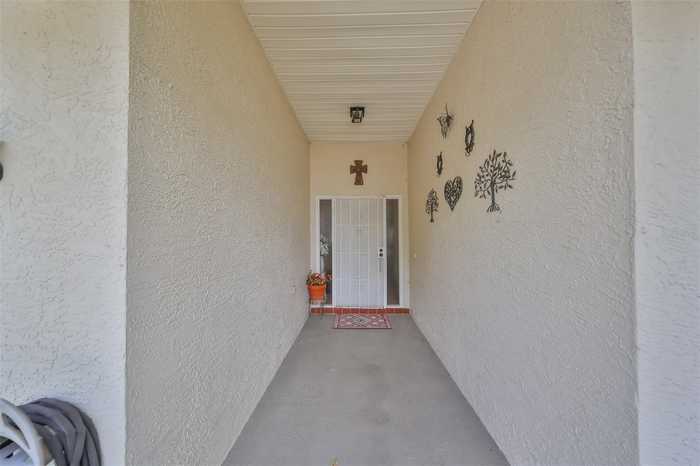 photo 2: 909 SUN KEY COURT, SUN CITY CENTER FL 33573