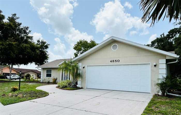 photo 2: 4850 COUNTRY MEADOWS BOULEVARD, SARASOTA FL 34235