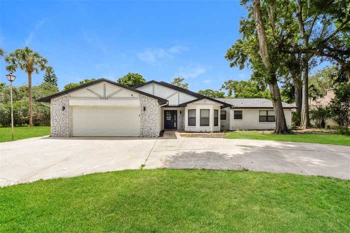 photo 1: 9720 FAIRWAY CIRCLE, LEESBURG FL 34788