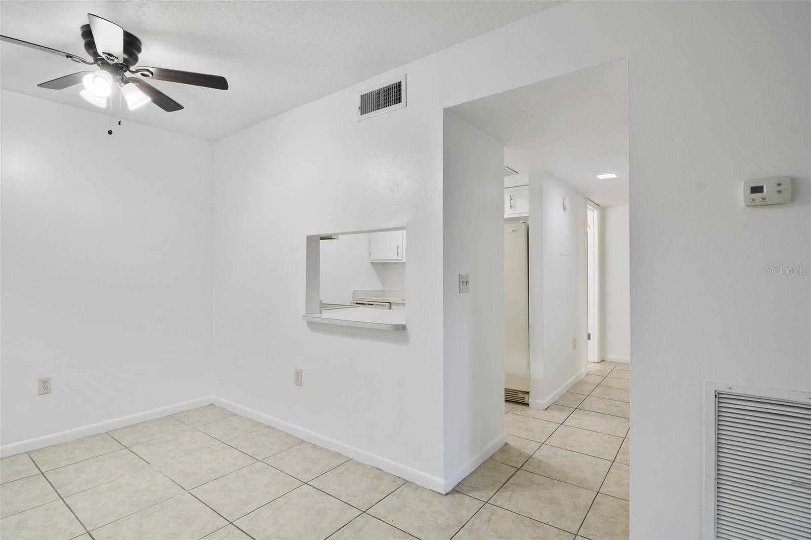 photo 3: 3294 S SEMORAN BOULEVARD Unit 12, ORLANDO FL 32822