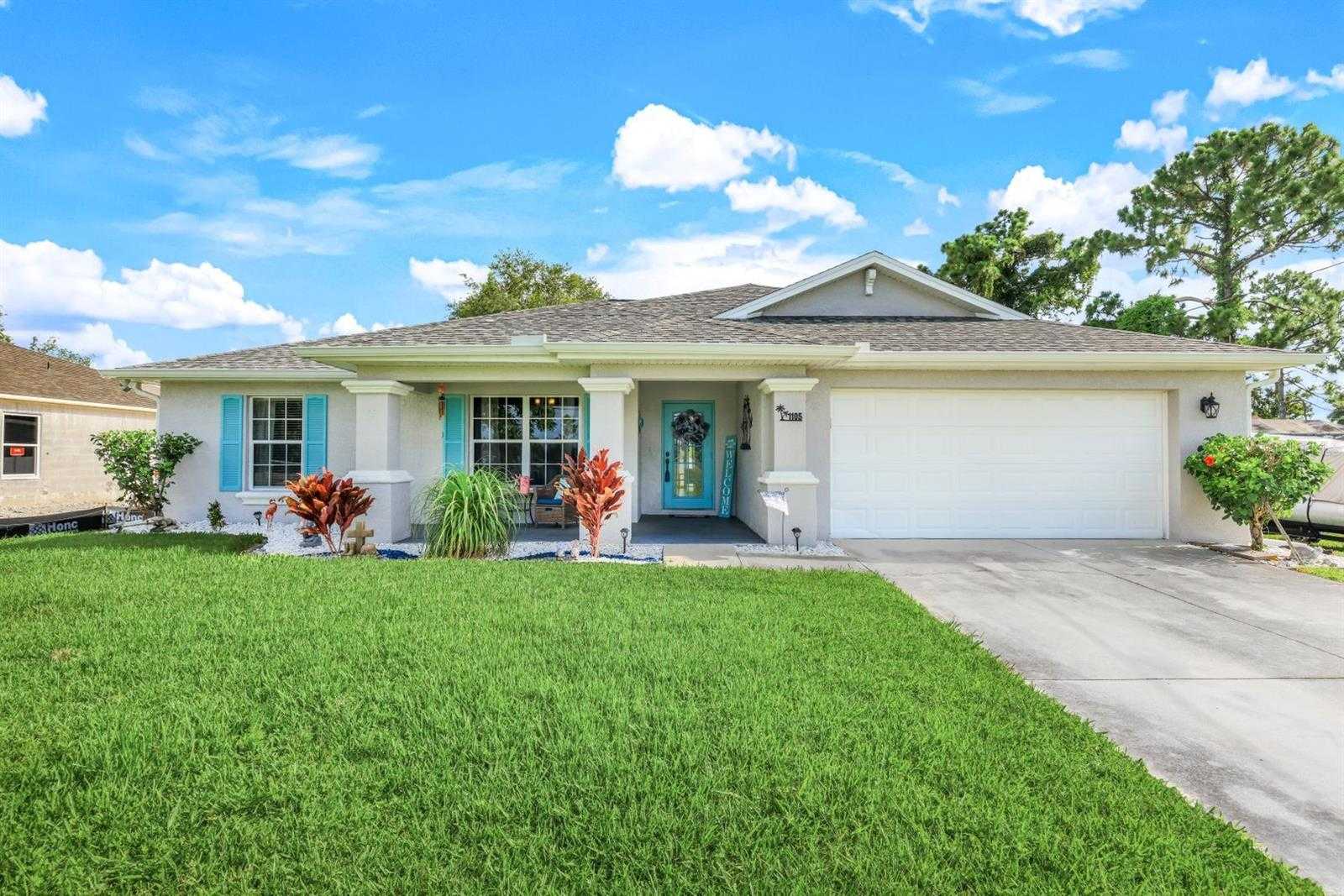 photo 1: 1105 NE 32ND LANE, CAPE CORAL FL 33909