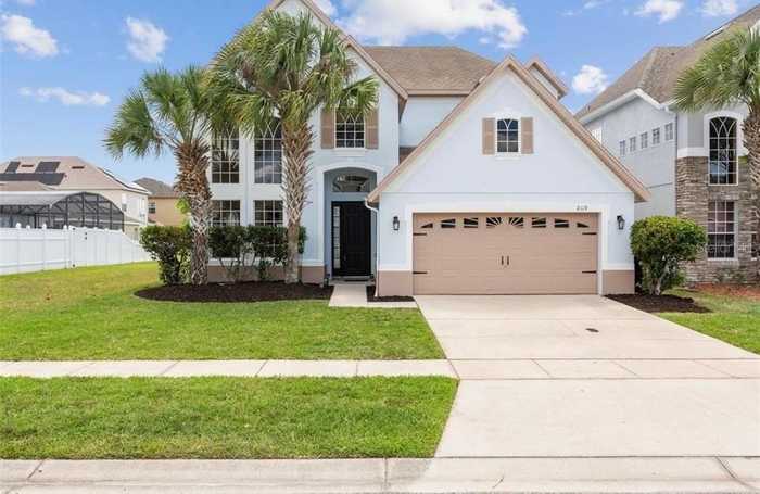 photo 1: 2119 WINDCREST LAKE CIRCLE, ORLANDO FL 32824