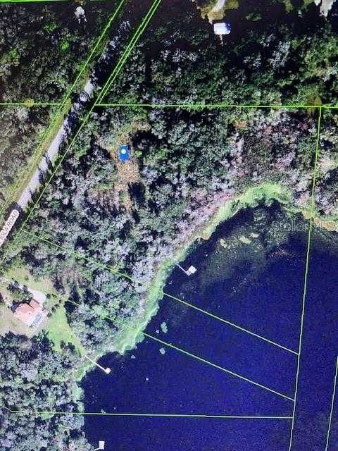 photo 1: 17700 LAKE IOLA ROAD, DADE CITY FL 33523