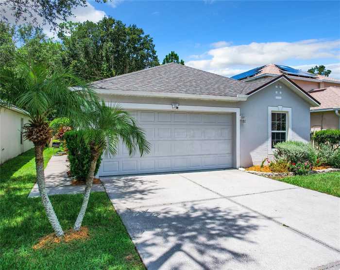 photo 1: 2076 WHISPERING TRAILS BLVD, WINTER HAVEN FL 33884