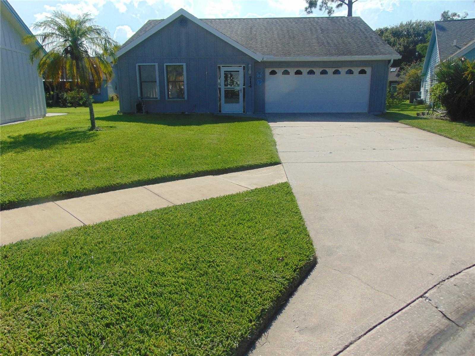 photo 1: 714 FOX TAIL COURT, NEW SMYRNA BEACH FL 32168