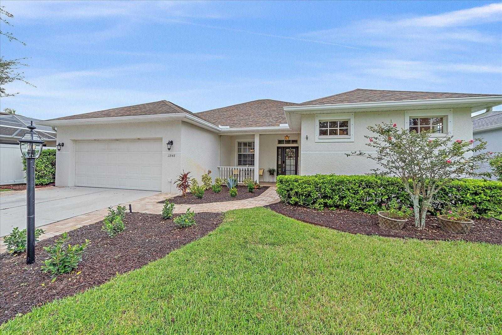 photo 1: 11848 HOLLYHOCK DRIVE, LAKEWOOD RANCH FL 34202