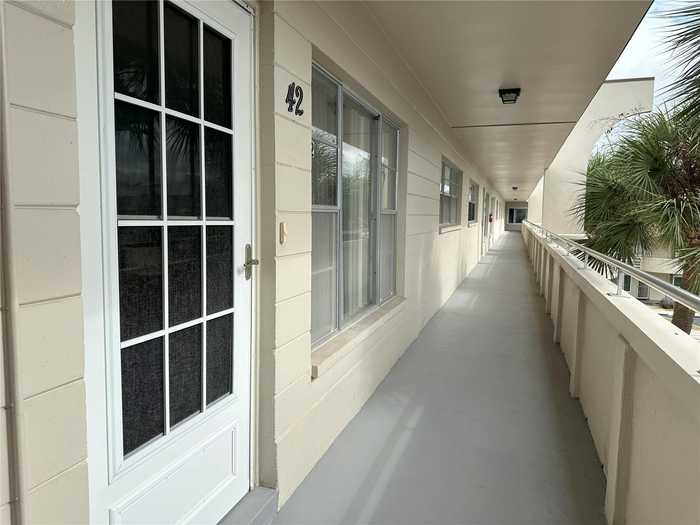 photo 1: 2378 ECUADORIAN WAY Unit 42, CLEARWATER FL 33763